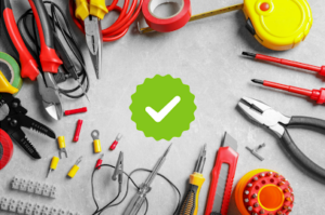 Green checkmark in middle of electrical tools